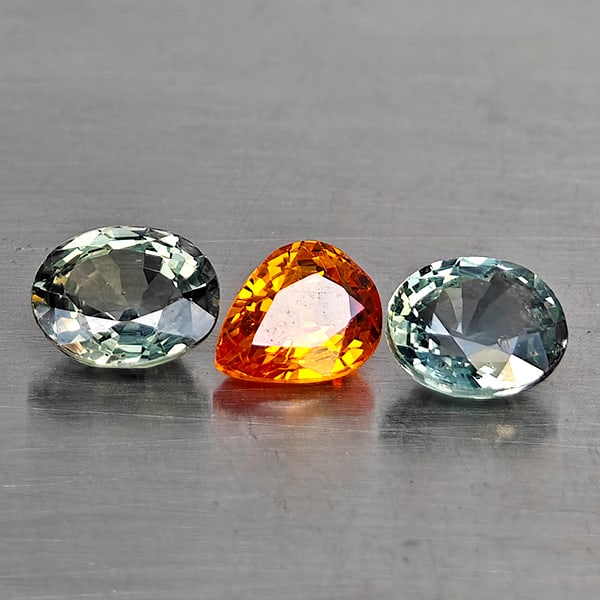 Natural Fancy Color Songea Sapphire Gemstones 1.74 Ct. 3 Pcs. Mixed Shape And Mixed Size: Product ID: 806130577 Product Name: Natural Yellow Sapphire Weight: 1.49 CT. Size: 5.3 x 4.3 x 2.8 to 5.1 x 4.1 x 2.5 MM. Shape: Mixed Shape Color: Fancy Color Clarity:VVS Luster: Good Gems Origin: Ta
