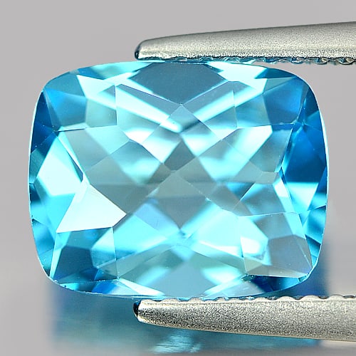 Natural Swiss Blue Topaz Gemstones 3.39 Ct. Cushion Checkerboard 10 x 8 Mm.: Product ID: 807166151 Product Name: Natural Blue Topaz Weight: 3.39 CT. Size: 10 x 8 x 5 MM. Shape: Cushion Checkerboard Color: Blue Clarity:VVS Luster: Good Gems Origin: Brazil Treatment: Treated Cry