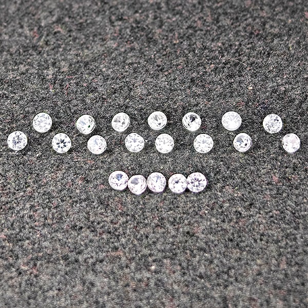 Natural White Zircon Gemstones 0.81 Ct. 20 Pcs. Round Diamond Cut 1.8 Mm.: Product ID: 807743137 Product Name: Natural Zircon Weight: 0.81 CT. Size: 1.8 x 1.8 x 1.3 MM. Shape: Round Diamond Cut Color: White Clarity:VSI Luster: Good Gems Origin: Cambodia Treatment: Heated Cry
