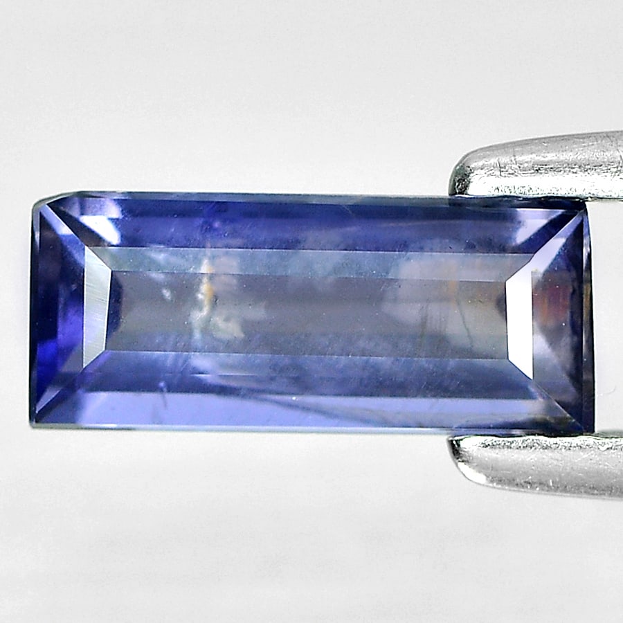 Natural Violet Blue Iolite Gemstones 0.84 Ct. Baguette Shape 9.3 x 4 Mm.: Product ID: 803804815 Product Name: Natural Iolite Weight: 0.84 CT. Size: 9.3 x 4 x 3 MM. Shape: Baguette Color: Violet Blue Clarity:SI1 Luster: Good Gems Origin: Madagascar Treatment: Unheated Crysta