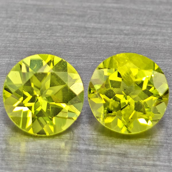 Natural Green Peridot Gemstones 1.46 Ct. 2 Pcs. Round Shape 5.2 Mm.: Product ID: 805317698 Product Name: Natural Weight: 1.46 CT. Size: 5.2 x 5.2 x 3.2 MM. Shape: Round Shape Color: Green Clarity:VSI Luster: Good Gems Origin: Pakistan Treatment: Unheated Crystal Struct