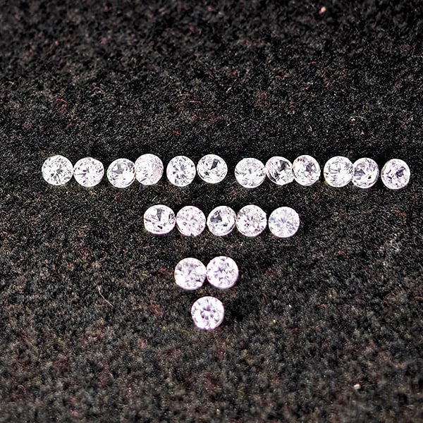 Natural White Zircon Gemstones 0.81 Ct. 20 Pcs. Round Diamond Cut 1.8 Mm.: Product ID: 807743134 Product Name: Natural Zircon Weight: 0.81 CT. Size: 1.8 x 1.8 x 1.3 MM. Shape: Round Diamond Cut Color: White Clarity:VSI Luster: Good Gems Origin: Cambodia Treatment: Heated Cry