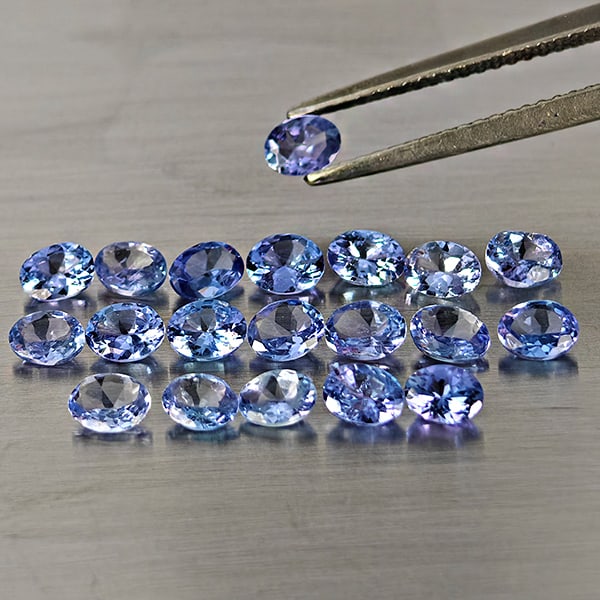 Natural Violetish Blue Tanzanite Gemstones 4.57 Ct. 20 Pcs. Oval Shape and Mixed Size: Product ID: 807015135 Product Name: Natural Tanzanite Weight: 4.57 CT. Size: 4.3 x 3.2 x 3 to 4.1 x 3.1 x 3 MM. Shape: Oval Color: Violetish Blue Clarity:VSI Luster: Good Gems Origin: Tanzania Treatme