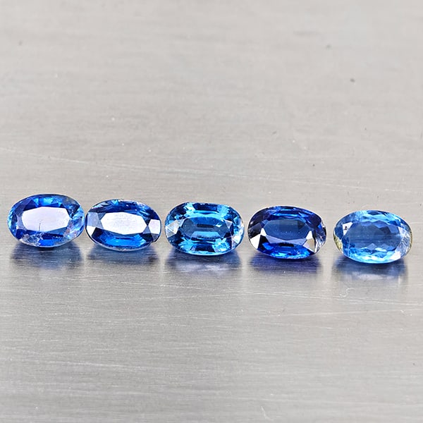 Natural Blue kyanite Gemstones 3.24 Ct. 5 Pcs. Oval Shape and Mixed Size: Product ID: 804204438 Product Name: Natural Kyanite Weight: 3.24 CT. Size: 6.4 x 4.1 x 3.2 to 6 x 4.1 x 2.6 MM. Shape: Oval Shape Color: Blue Clarity:VSI - SI1 Luster: Good Gems Origin: Sri - Lanka Tr