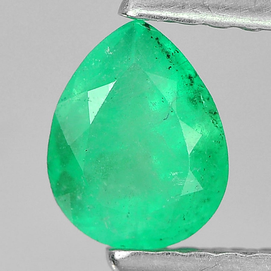 Natural Green Emerald Gemstones 0.60 Ct. Pear Shape 6.2 x 4.8 Mm.: Product ID: 802403428 Product Name: Natural Emerald Weight: 0.60 CT. Size: 6.2 x 4.8 x 3.8 MM. Shape: Pear Color: Green Clarity:SI1 Luster: Good Gems Origin: Columbia Treatment: Unheated Crystal Struc
