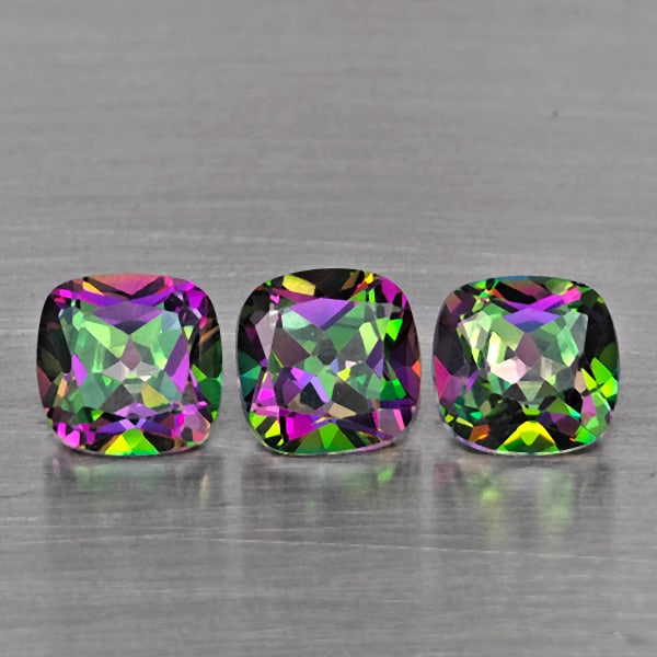 Natural Mystic Green Topaz Gemstones 3.51 Ct. 3 Pcs. Cushion Shape 6.1 x 6.1 Mm.: Product ID: 807169098 Product Name: Natural Topaz Weight: 3.51 CT. Size: 6.1 x 6.1 x 4 MM. Shape: Cushion Shape Color: Mystic Green Clarity:VSI Luster: Good Gems Origin: Brazil Treatment: Treated Crys