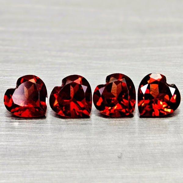 Natural Purplish Red Rhodolite Garnet Gemstones 3.63 Ct. 4 Pcs. Heart Shape 6.1 x 6 Mm.: Product ID: 802936689 Product Name: Natural Rhodolite Weight: 3.63 CT. Size: 6.1 x 6 x 3.4 MM. Shape: Heart Shape Color: Purplish Red Clarity:VSI Luster: Good Gems Origin: Madagascar Treatment: Unheat