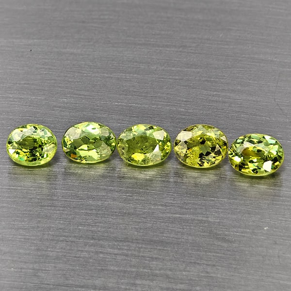 Natural Green Demantiod Garnet Gemstones 1.28 Ct. 5 Pcs. Oval Shape 4.2 x 3 Mm.: Product ID: 802937514 Product Name: Natural Demantoid Weight: 1.28 CT. Size: 4.2 x 3 x 2 MM. Shape: Oval Color: Green Clarity:SI1 Luster: Good Gems Origin: Madagascar Treatment: Unheated Crystal Struc