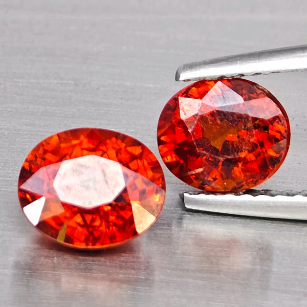 Natural Orangish Red Spessartine Garnet Gemstones 3.17 Ct. 2 Pcs. Oval Shape And Mixed Size: Product ID: 802937972 Product Name: Natural Garnet Weight: 3.17 CT. Size: 7.2 x 6 x 4.4 to 6.7 x 5.8 x 4.8 MM. Shape: Oval Color: Orangish Red Clarity:SI1 Luster: Good Gems Origin: Namibia Treatment: 