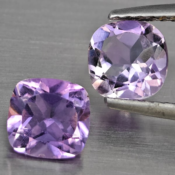 Natural Purple Amethyst Gemstones 1.59 Ct. 2 Pcs. Cushion Shape 5.9 Mm.: Product ID: 800325576 Product Name: Natural Amethyst Weight: 1.59 CT. Size: 5.9 x 5.9 x 3.9 MM. Shape: Cushion Shape Color: Purple Clarity:SI1 Luster: Good Gems Origin: Brazil Treatment: Unheated Crys