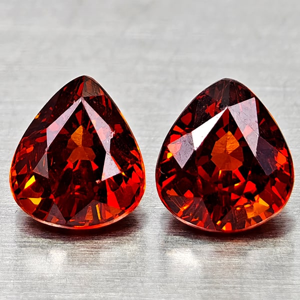Natural Orangish Red Spessartine Garnet Gemstones 1.79 Ct. 2 Pcs. Pear Shape: Product ID: 802936928 Product Name: Natural Spessartine Weight: 1.79 CT. Size: 5.8 x 5.1 x 3.6 to 6 x 5.1 x 3.7 MM. Shape: Pear Shape Color: Orangish Red Clarity:VSI Luster: Good Gems Origin: Namibia 
