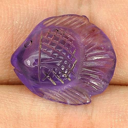 Natural Violet Amethyst Gemstones 6.77 Ct. Fish Carving 16 x 14 Mm.: Product ID: 810303465 Product Name: Natural Amethyst Weight: 6.77 CT. Size: 16 x 14 x 6.7 MM. Shape: Fish Carving Color: Violet Clarity:Semi - Transparent Luster: Good Gems Origin: Brazil Treatment: U