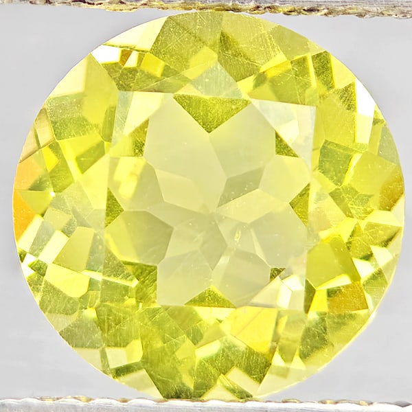 Natural Yellow Lemon Quartz Gemstones 2.64 Ct. Round Shape 9.1 Mm.: Product ID: 805530132 Product Name: Natural Quartz Weight: 2.64 CT. Size: 9.1 x 9.1 x 5.8 MM. Shape: Round Color: Yellow Lemon Clarity:VSI Luster: Good Gems Origin: Brazil Treatment: Unheated Crystal 