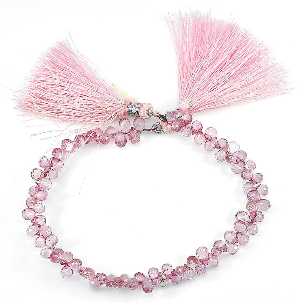 67.80 Ct. Briolette Shape Natural Gemstones Pink Topaz Beads Length 8 Inch: Product ID: 807136423 Product Name: Natural Topaz Weight: 67.80 CT. Size: 8 Inch / 7.9 x 4.3 x 4.3 MM. Shape: Briolette With Drilled Color: Pink Clarity:IF - VVS Luster: Good Gems Origin: Brazil Treat