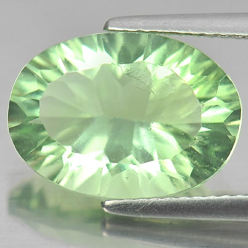 Natural Green Fluorite Gemstones 6.72 Ct. Oval Concave Cut 14.2 x 10.2 Mm.: Product ID: 802704296 Product Name: Natural Fluorite Weight: 6.72 CT. Size: 14.2 x 10.2 x 6.8 MM. Shape: Oval Concave Cut Color: Green Clarity:VSI Luster: Good Gems Origin: Brazil Treatment: Unheated 