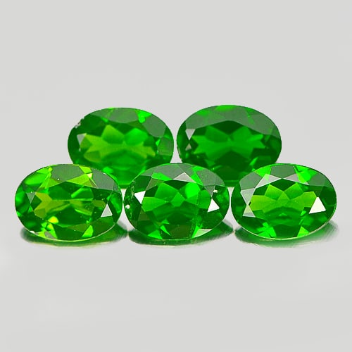 Natural Green Chrome Diopside Gemstones 3.71 Ct. 5 Pcs. Oval Shape 7 x 5 Mm.: Product ID: 801604822 Product Name: Natural Chrome Diopside Weight: 3.71 CT. Size: 7 x 5 x 2.8 MM. Shape: Oval Color: Green Clarity:VSI Luster: Good Gems Origin: Russia Treatment: Unheated Crystal Str