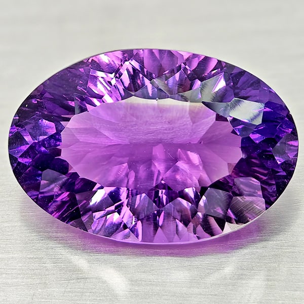 Natural Purple Amethyst Gemstones 22.01 Ct. Oval Concave Cut 20.3 x 15.6 Mm. (1 of 3)