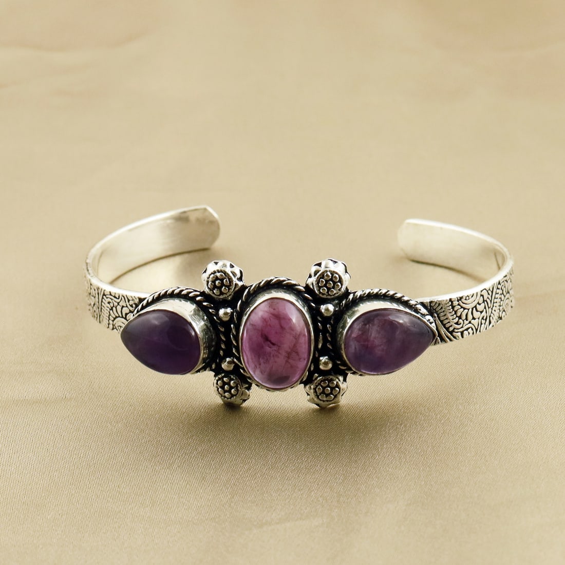 Natural Amethyst Sterling Silver Plated Handmade Cuff Bangle: Product ID: 260807165635 Product - Handmade Silver Plated Cuff Bangle Metal - 92.5 Sterling Silver Plated Bangle Size - 7x5 CM (Adjustable) Gemstone - Amethyst Gemstone Origin - Africa Gemstone Size -