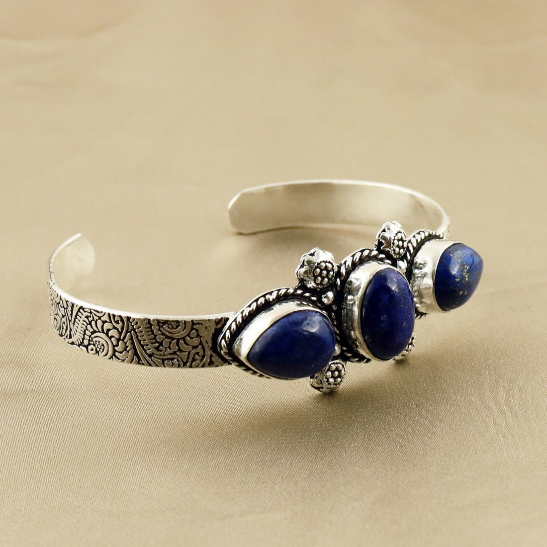 Natural Lapis Lazuli Sterling Silver Plated Handmade Cuff Bangle: Product ID: 260807165736 Product - Handmade Silver Plated Cuff Bangle Metal - 92.5 Sterling Silver Plated Bangle Size - 7x5 CM (Adjustable) Gemstone - Lapis Lazuli Gemstone Origin - Afghanistan Gemsto