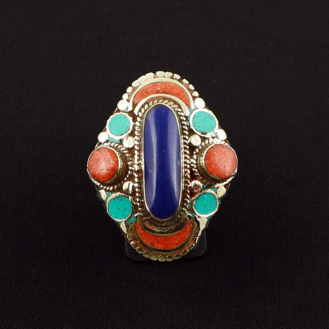 Tibetan Turquoise, Coral & Lapis Lazuli Handmade Ethnic Ring - Free Size: Product ID: 260801130124 Product - Tibetan Handmade Ethnic Ring Ring Size - Free Size Ring Weight - 21 Gram Gemstone - Turquoise & Coral & Lapis Lazuli Metal - Brass & Copper mix Metal Origin - Nepal 