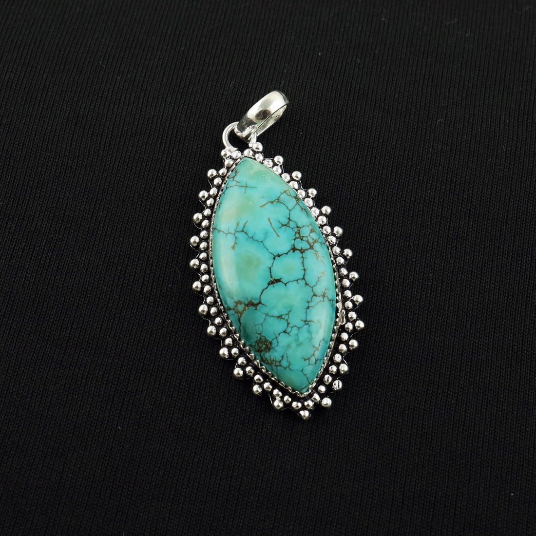 Natural Turquoise 2 Micron Sterling Silver Plated Handmade Pendant: Product ID: 260818145919 Product - Handmade Silver Plated Pendant Metal - 92.5 2 Micron Sterling Silver Plated Gemstone - Turquoise Gemstone Origin - Tibet Gemstone Shape - Eye Gemstone Size - 4.5X2 C