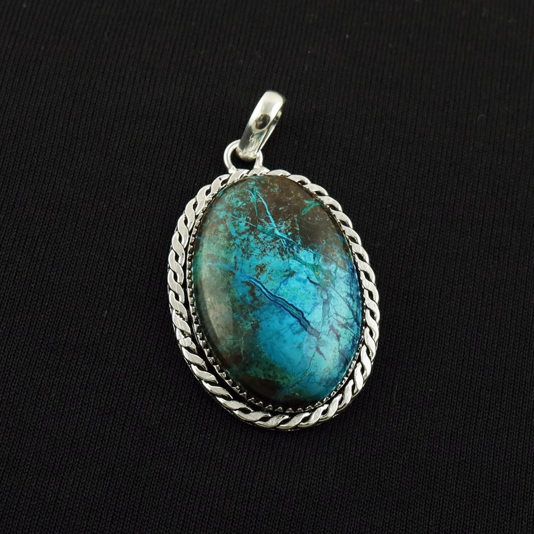 Natural Shattuckite 2 Micron Sterling Silver Plated Handmade Pendant: Product ID: 260818144628 Product - Handmade Silver Plated Pendant Metal - 92.5 2 Micron Sterling Silver Plated Gemstone - Shattuckite Gemstone Origin - United States Gemstone Shape - Oval Gemstone Siz