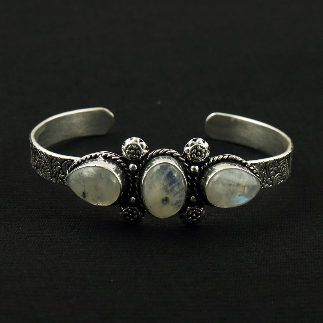 Natural Rainbow Moonstone Sterling Silver Plated Handmade Cuff Bangle: Product ID: 260811174509 Product - Handmade Silver Plated Cuff Bangle Metal - 92.5 Sterling Silver Plated Bangle Size - 7x5 CM (Adjustable) Gemstone - Rainbow Moonstone Gemstone Origin - India Gemston