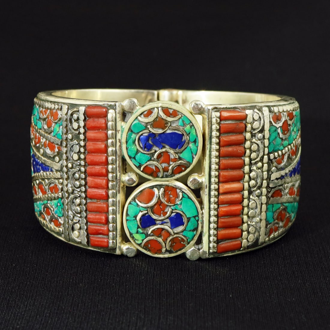 Tibetan Turquoise & Coral Handmade Ethnic Vintage Cuff Bangle: Product ID: 260721191642 Product - Tibetan Handmade Ethnic Cuff Bangle Bangle Size - 7X7.5 CM Bangle Weight - 150 Gram ( Approx) Gemstone - Turquoise & Coral & Lapis Lazuli Metal - Brass & Copper mix 