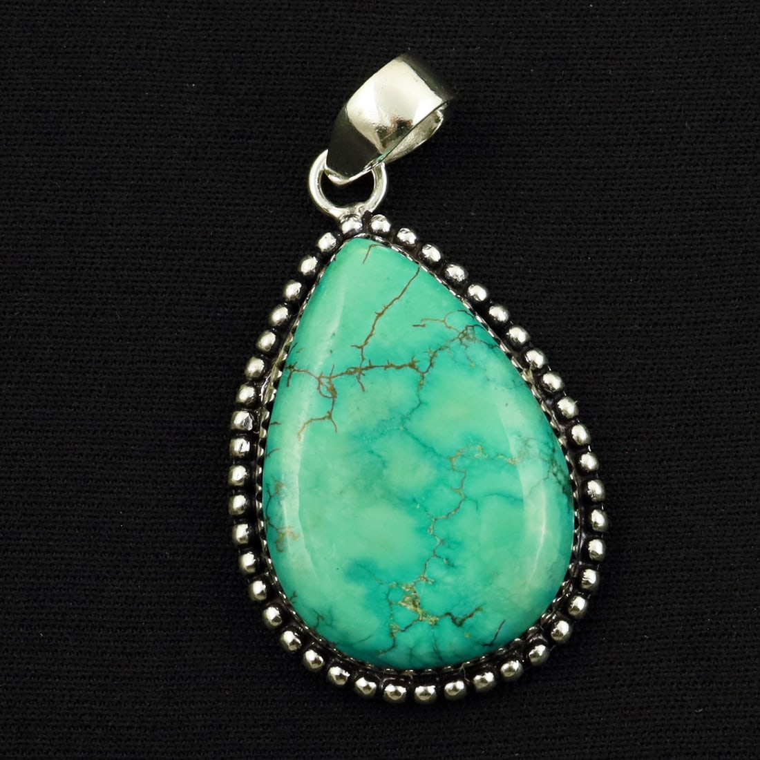 Natural Turquoise Sterling Silver Plated Handmade Pendant: Product ID: 260714164711 Product - Handmade Silver Plated Pendant Metal - 92.5 Sterling Silver Plated Pendant Size - 3.5x2 CM Gemstone - Turquoise Gemstone Origin - Tibet Gemstone Shape - Pear Pendant