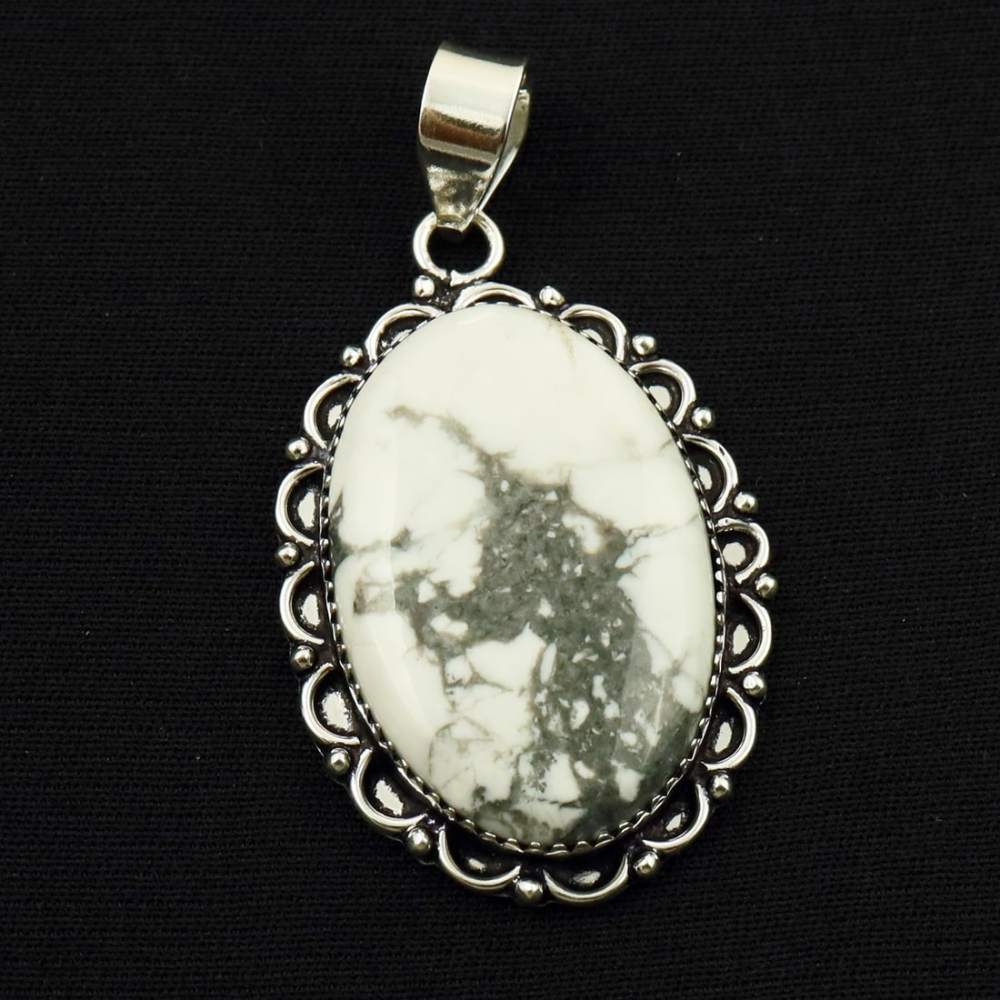 Natural Howlite Sterling Silver Plated Handmade Pendant: Product ID: 260714160615 Product - Handmade Silver Plated Pendant Metal - 92.5 Sterling Silver Plated Pendant Size - 4x2.5 CM Gemstone - Howlite Gemstone Origin - Canada Gemstone Shape - Oval Pendant 