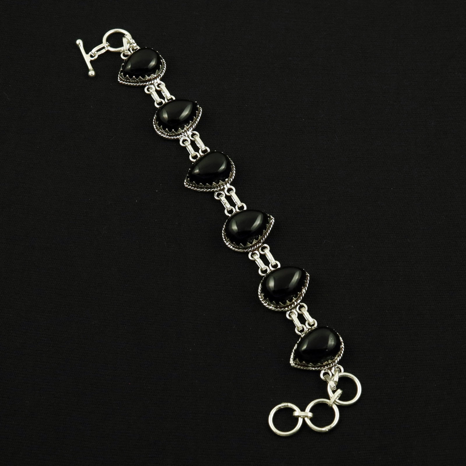 Natural Black Onyx Sterling Silver Plated Handmade Bracelet: Product ID: 260704122227 Product - Handmade Silver Plated Bracelet Metal - 92.5 Sterling Silver Plated Bracelet Length - 6 Inch + 2 Inch Gemstone - Black Onyx Gemstone Size -12X16 ( 6 Stone) Gemstone 