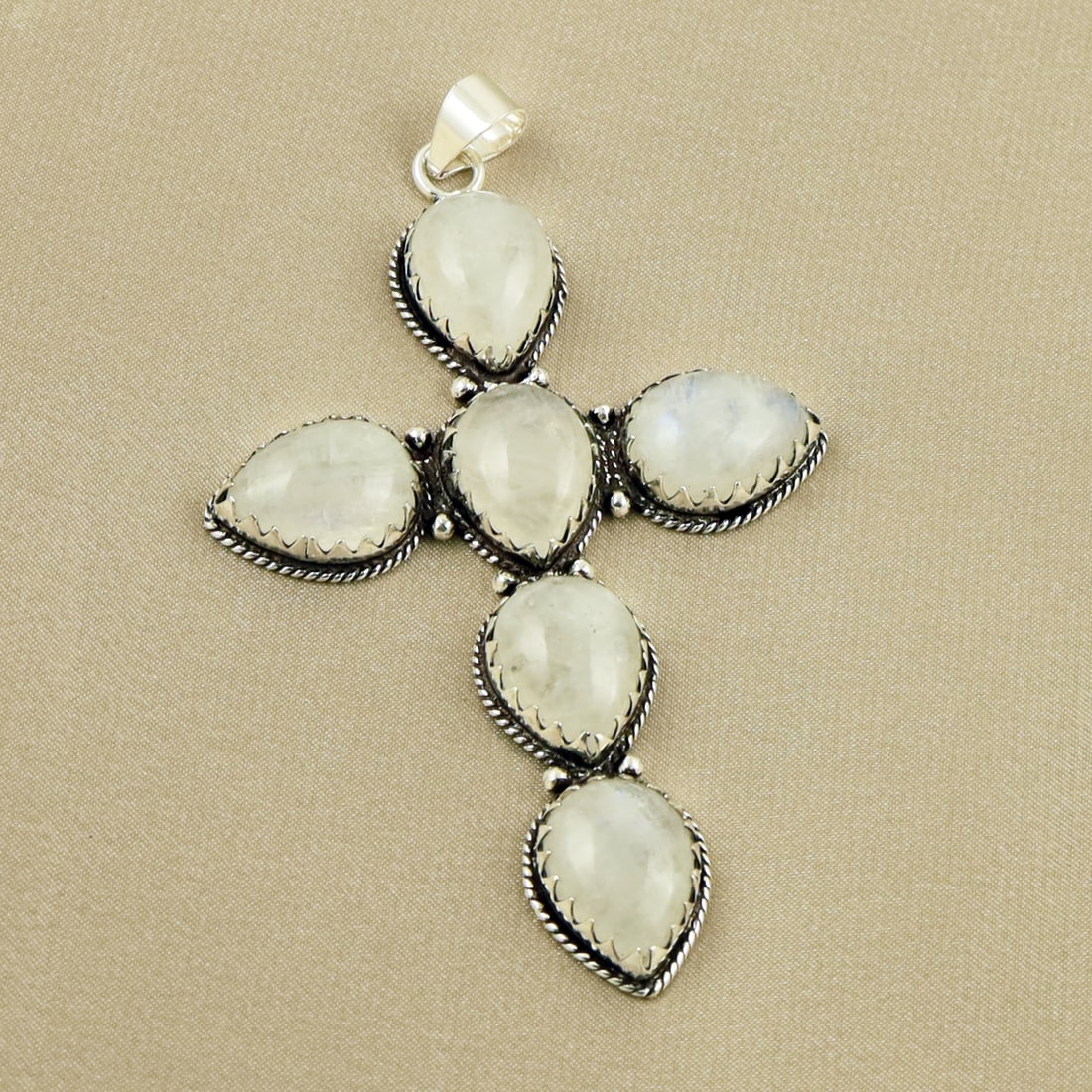 Natural Rainbow Moonstone Sterling Silver Plated Handmade Pendant: Product ID: 260704121125 Product - Handmade Sterling Silver Plated Pendant Metal - 92.5 Sterling Silver Plated Pendant Size - 3.5x2 Inch Gemstone - Rainbow Moonstone Gemstone Origin - India Gemstone S