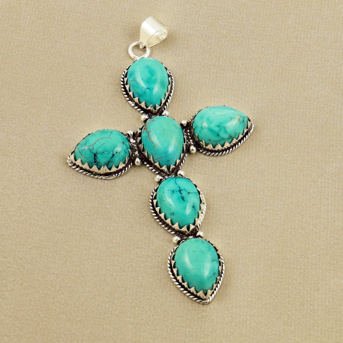 Natural Turquoise Sterling Silver Plated Handmade Cross Pendant: Product ID: 260704120942 Product - Handmade Silver Plated Pendant Metal - 92.5 Sterling Silver Plated Pendant Size - 3.5x2 Inch Gemstone - Turquoise Gemstone Origin - Tibet Gemstone Size - 12x16 MM ( 