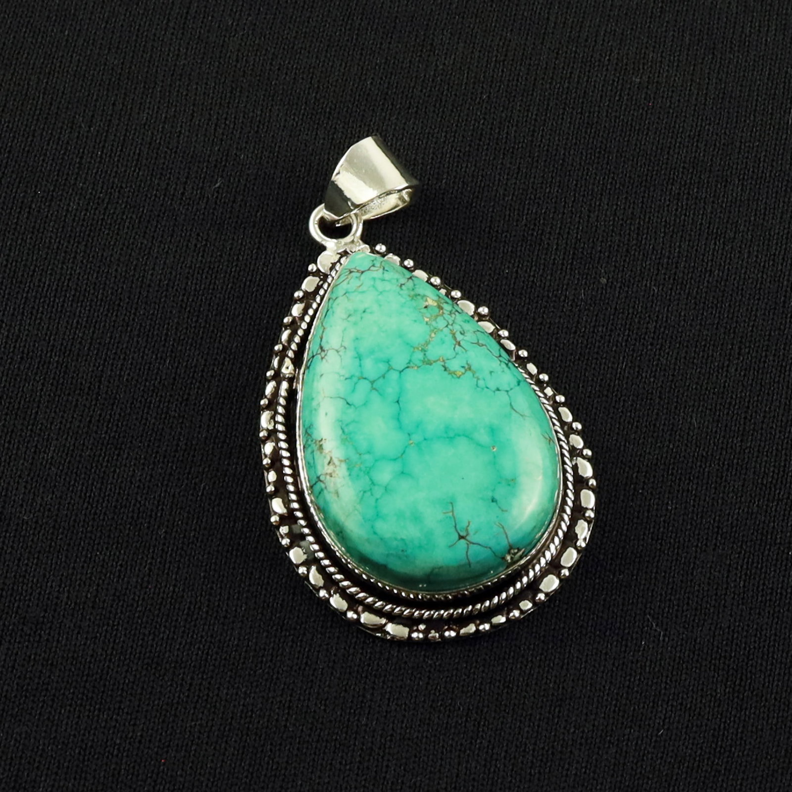 Natural Turquoise Sterling Silver Plated Handmade Pendant: Product ID: 260701135805 Product - Handmade Silver Plated Pendant Metal - 92.5 Sterling Silver Plated Pendant Size - 4x2.5 CM Gemstone - Turquoise Gemstone Origin - Tibet Gemstone Shape - Pear Pendant