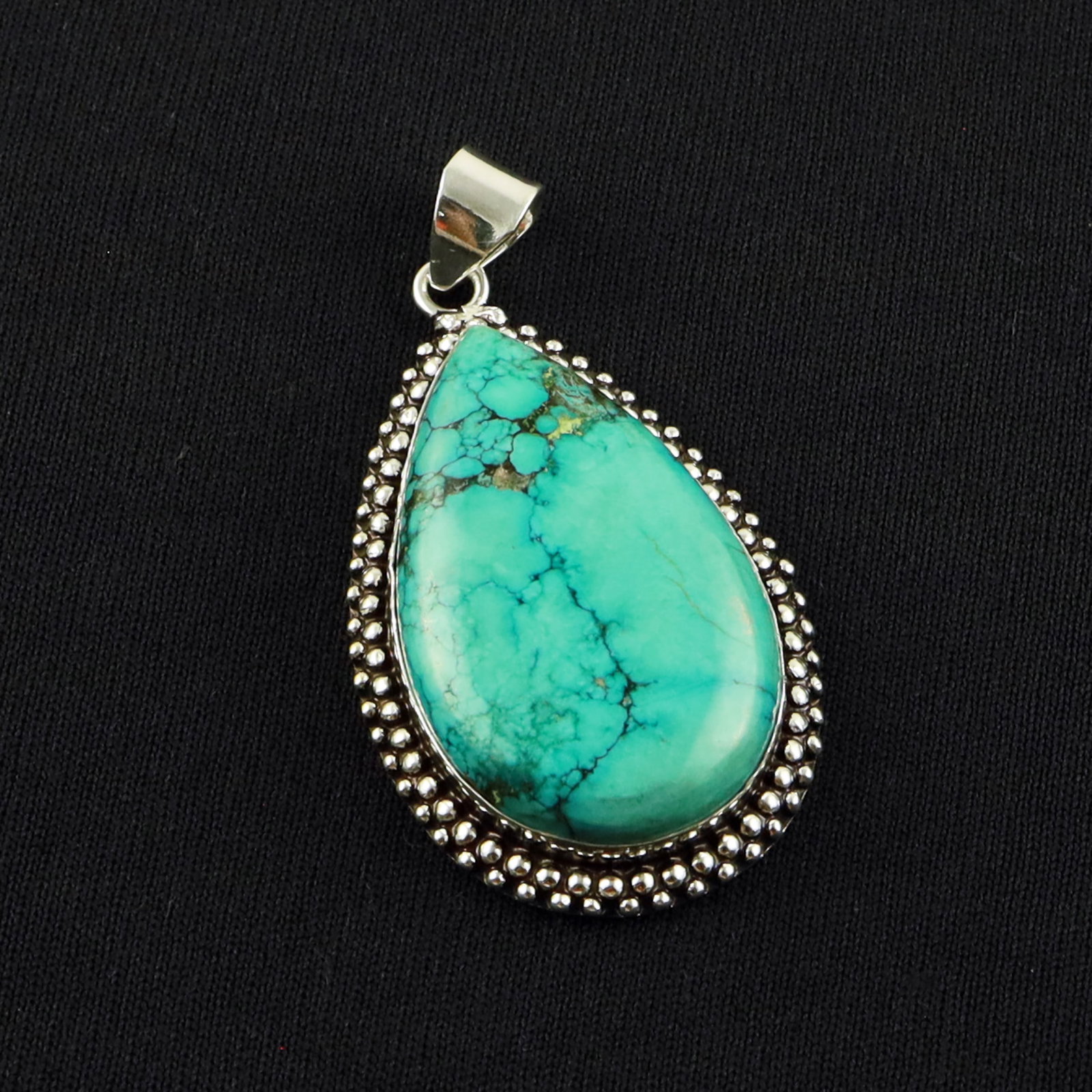 Natural Turquoise Sterling Silver Plated Handmade Pendant: Product ID: 260701135536 Product - Handmade Silver Plated Pendant Metal - 92.5 Sterling Silver Plated Pendant Size - 4x2.5 CM Gemstone - Turquoise Gemstone Origin - Tibet Gemstone Shape - Pear Pendant