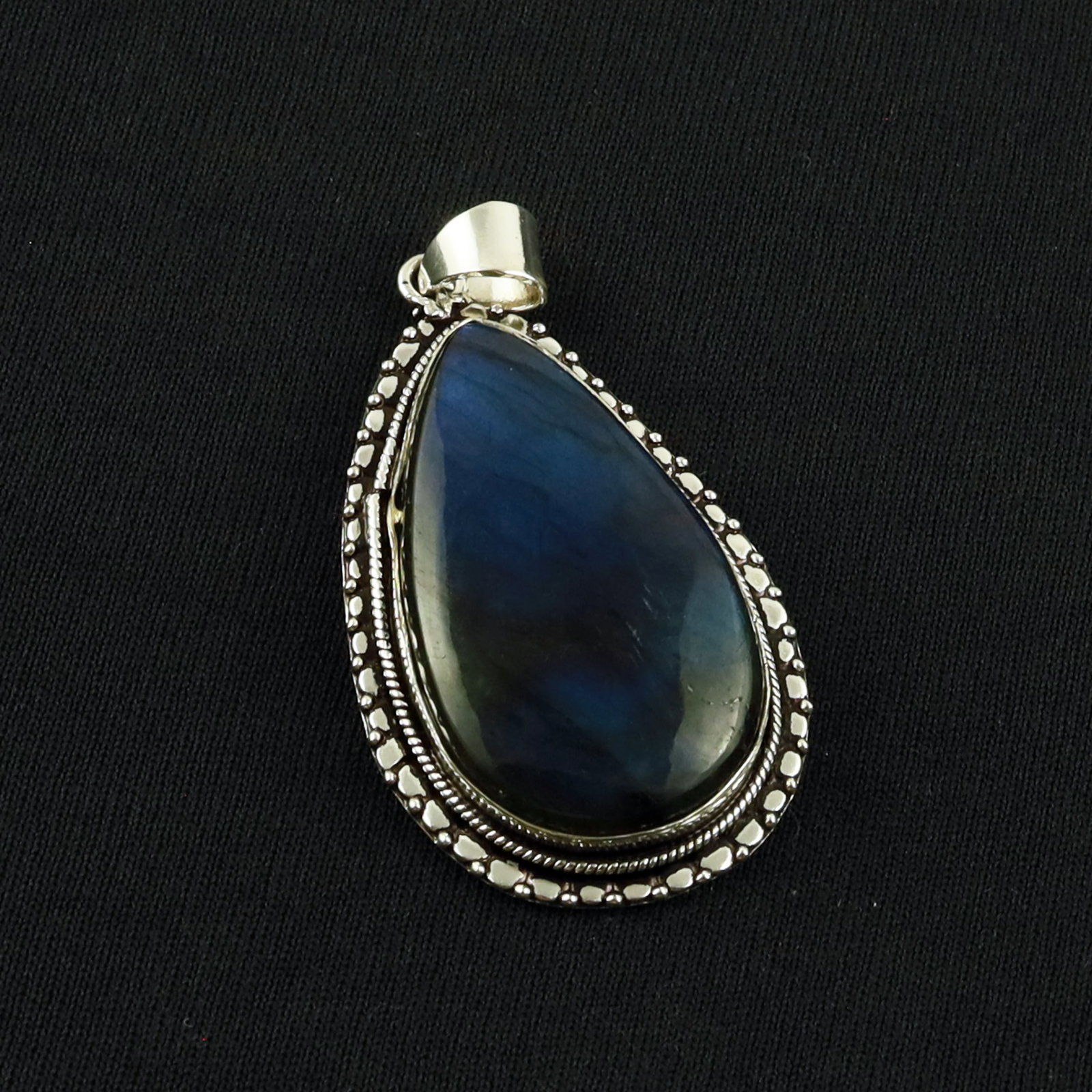 Natural Labradorite Sterling Silver Plated Handmade Pendant: Product ID: 260701135445 Product - Handmade Silver Plated Pendant Metal - 92.5 Sterling Silver Plated Pendant Size - 4.5x2.5 CM Gemstone - Labradorite Gemstone Origin - Canada Gemstone Shape - Pear Pe