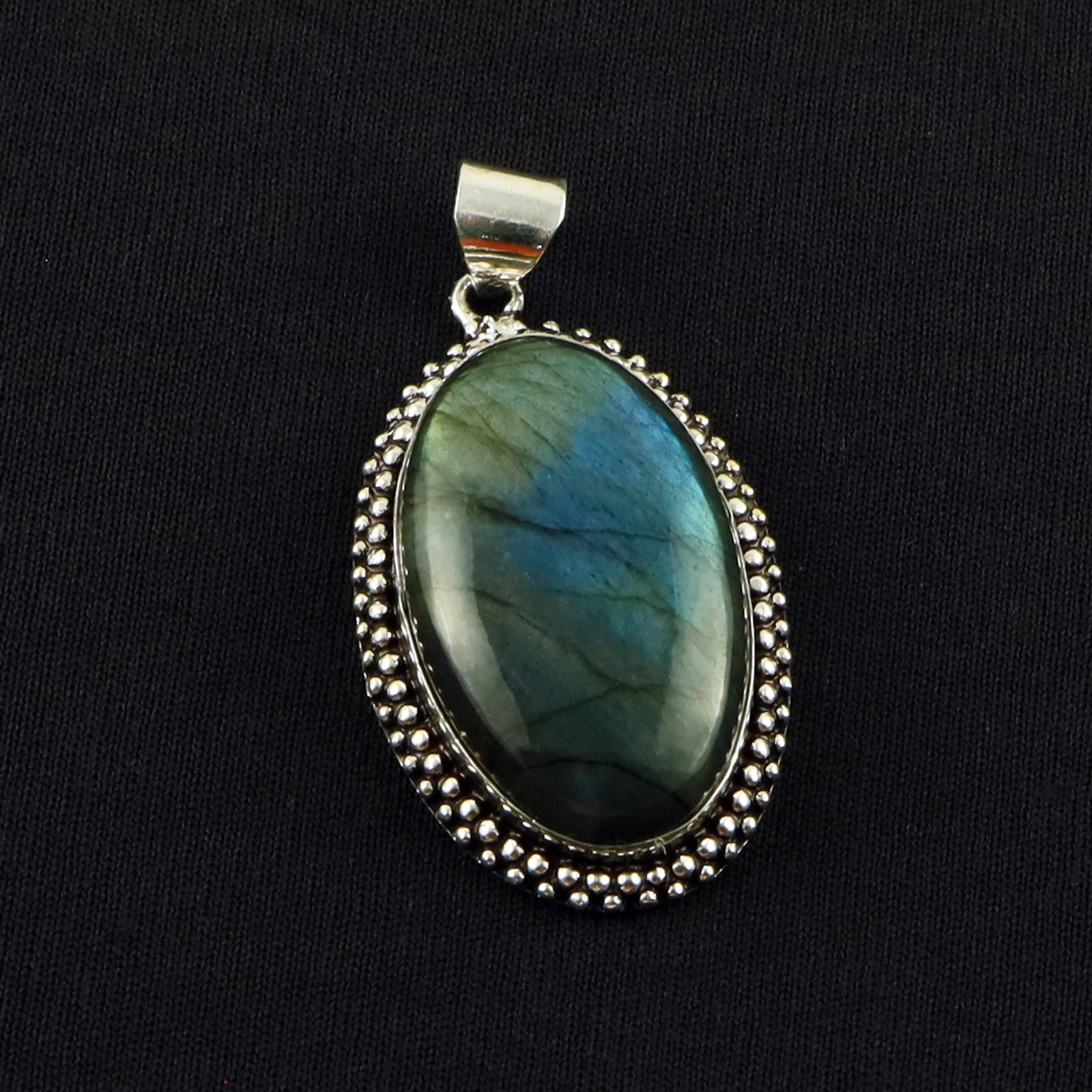 Natural Labradorite Sterling Silver Plated Handmade Pendant: Product ID: 260701135052 Product - Handmade Silver Plated Pendant Metal - 92.5 Sterling Silver Plated Pendant Size - 4x2.5 CM Gemstone - Labradorite Gemstone Origin - Canada Gemstone Shape - Oval Pend