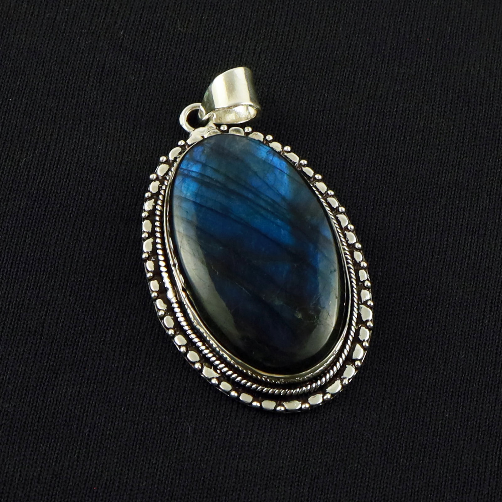 Natural Labradorite Sterling Silver Plated Handmade Pendant: Product ID: 260701134836 Product - Handmade Silver Plated Pendant Metal - 92.5 Sterling Silver Plated Pendant Size - 4x2.5 CM Gemstone - Labradorite Gemstone Origin - Canada Gemstone Shape - Oval Pend