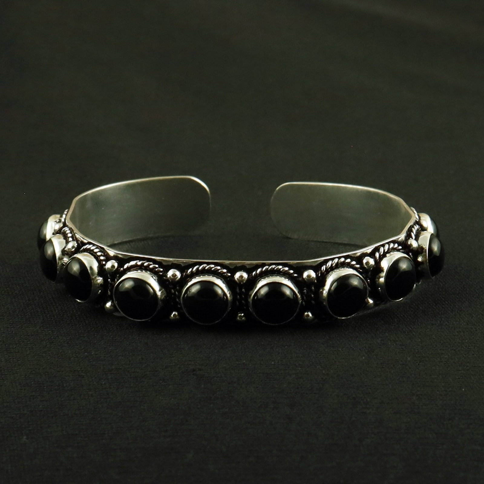 Natural Black Onyx Sterling Silver Plated Handmade Cuff Bangle: Product ID: 260618145712 Product - Handmade Silver Plated Cuff Bangle Metal - 92.5 Sterling Silver Plated Bangle Size - 6x5.5 CM (Adjustable) Gemstone - Black Onyx Gemstone Origin - India Gemstone Siz