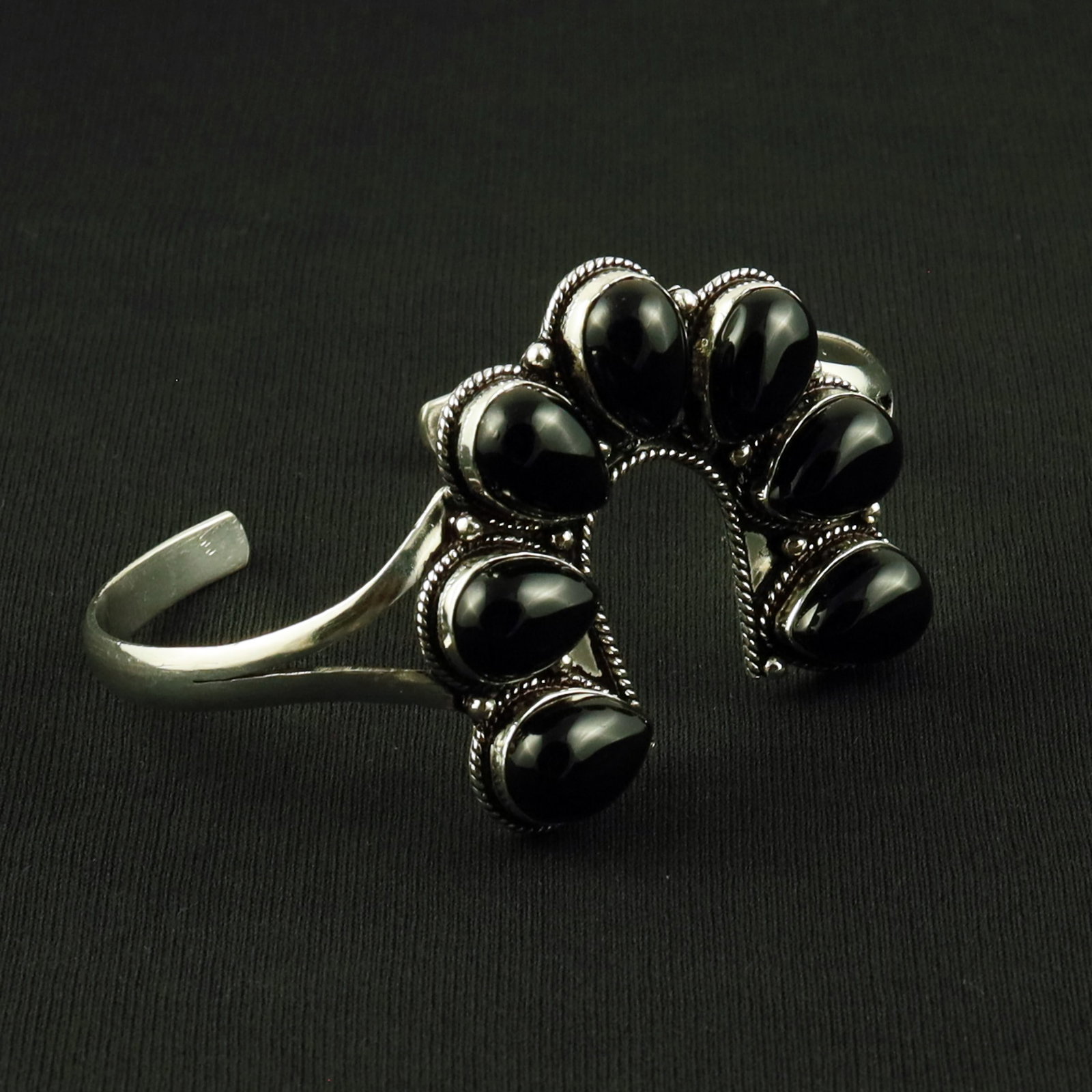 Natural Black Onyx Sterling Silver Plated Handmade Cuff Bangle: Product ID: 260617120348 Product - Handmade Silver Plated Cuff Bangle Metal - 92.5 Sterling Silver Plated Bangle Size - 7.5x5 CM (Adjustable) Gemstone - Black Onyx Gemstone Origin - India Gemstone Siz