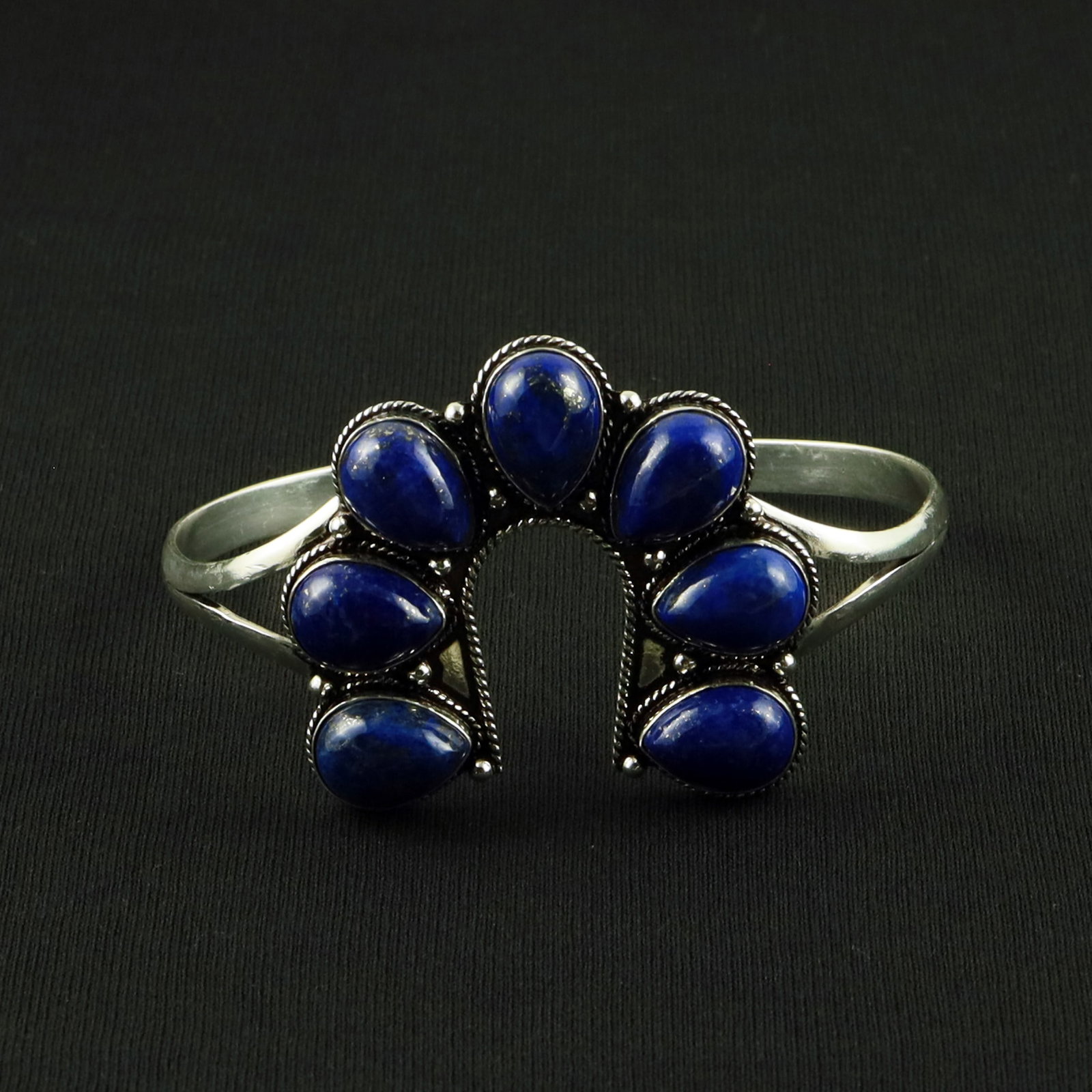 Natural Lapis Lazuli Sterling Silver Plated Handmade Cuff Bangle: Product ID: 260617115814 Product - Handmade Silver Plated Cuff Bangle Metal - 92.5 Sterling Silver Plated Bangle Size - 7.5x5 CM (Adjustable) Gemstone - Lapis Lazuli Gemstone Origin - Afghanistan Gems