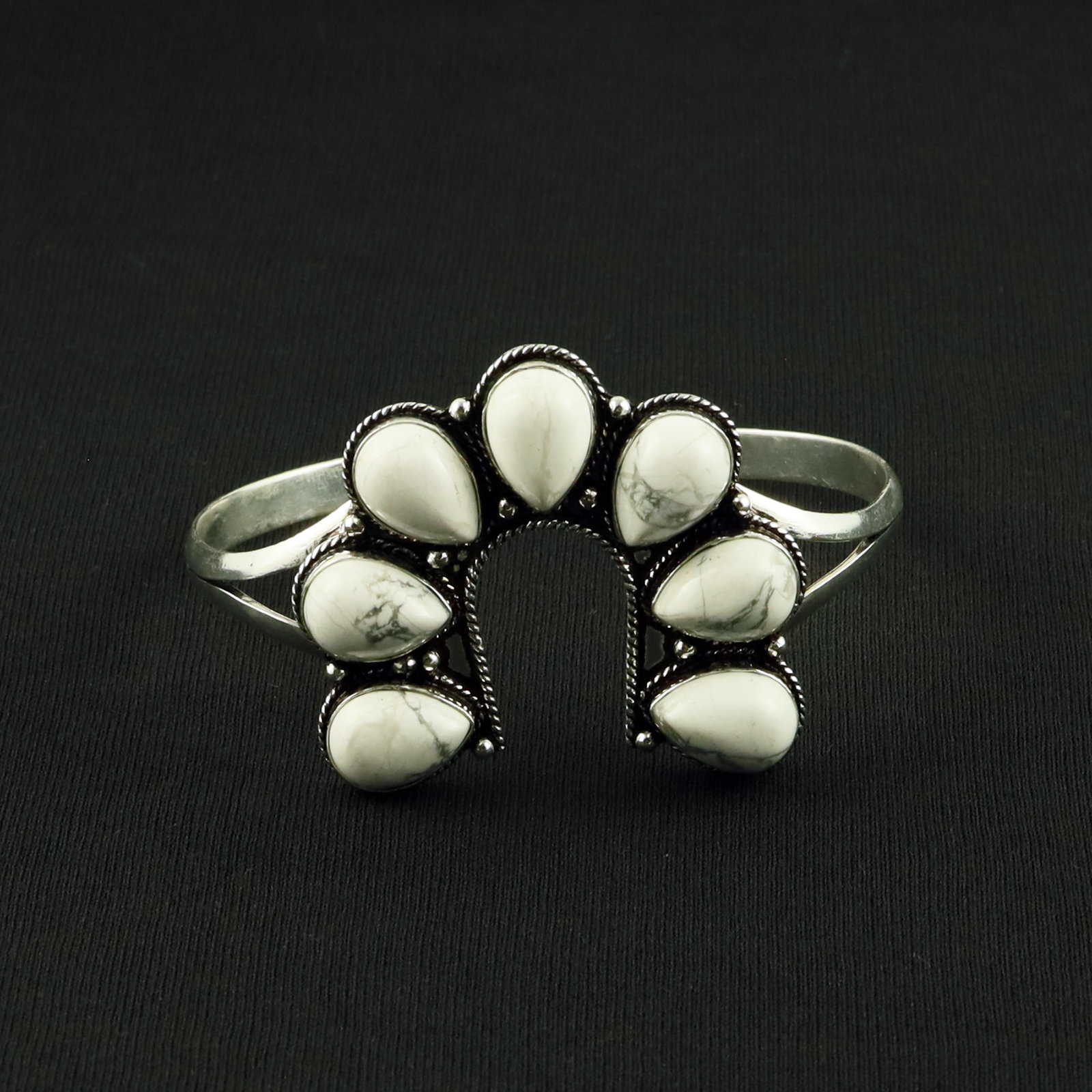 Natural Howlite Sterling Silver Plated Handmade Cuff Bangle: Product ID: 260617115605 Product - Handmade Silver Plated Cuff Bangle Metal - 92.5 Sterling Silver Plated Bangle Size - 7.5x5 CM (Adjustable) Gemstone - Howlite Gemstone Origin - Canada Gemstone Size 