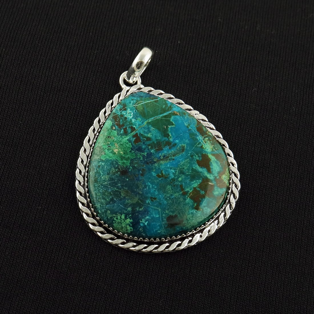 Natural Shattuckite 2 Micron Sterling Silver Plated Handmade Pendant: Product ID: 260818144223 Product - Handmade Silver Plated Pendant Metal - 92.5 2 Micron Sterling Silver Plated Gemstone - Shattuckite Gemstone Origin - United States Gemstone Shape - Pear Gemstone Siz