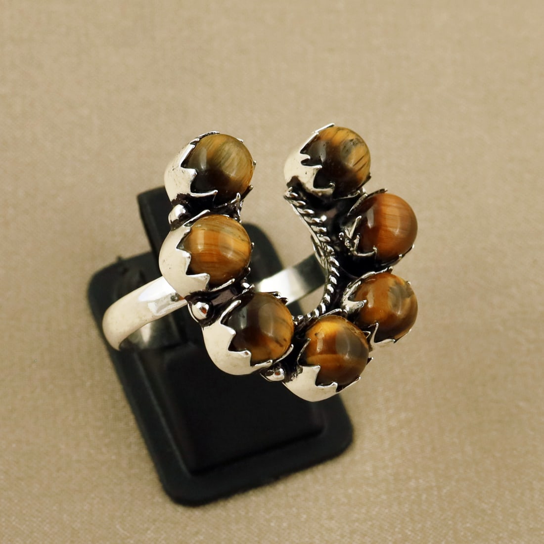 Natural Tiger Eye Sterling Silver Plated Handmade Ring - 11MM: Product ID: 260808134522 Product - Handmade Silver Plated Ring Metal - 92.5 Sterling Silver Plated Ring Size - 11MM Gemstone - Tiger Eye Gemstone Origin - Africa Gemstone Size - 6MM ( 7 Stone ) Gemsto