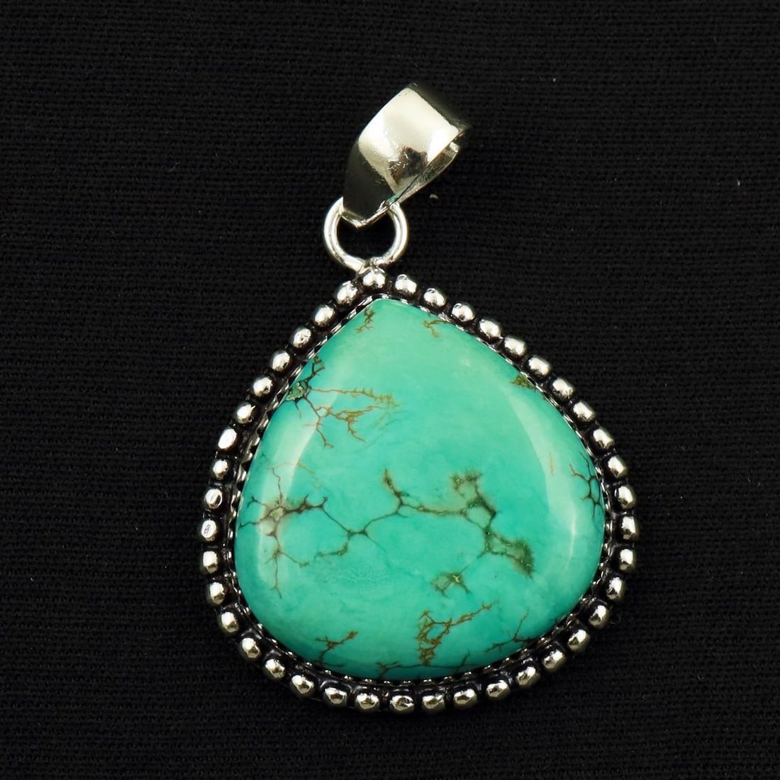 Natural Turquoise Sterling Silver Plated Handmade Pendant: Product ID: 260714165329 Product - Handmade Silver Plated Pendant Metal - 92.5 Sterling Silver Plated Pendant Size - 2.5x2.5 CM Gemstone - Turquoise Gemstone Origin - Tibet Gemstone Shape - Pear Penda