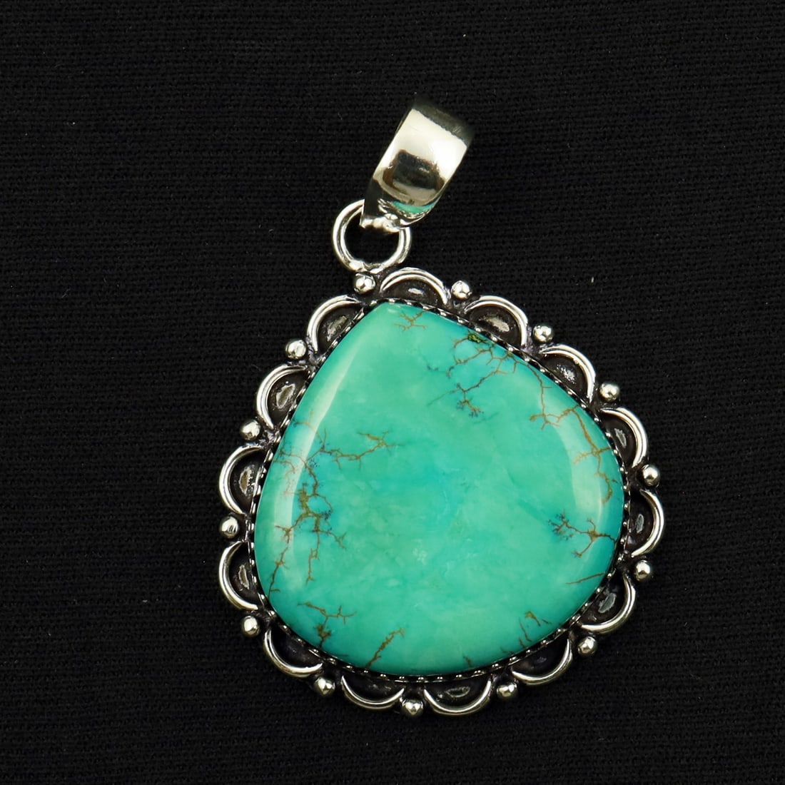 Natural Turquoise Sterling Silver Plated Handmade Pendant: Product ID: 260714165226 Product - Handmade Silver Plated Pendant Metal - 92.5 Sterling Silver Plated Pendant Size - 3x3 CM Gemstone - Turquoise Gemstone Origin - Tibet Gemstone Shape - Pear Pendant W