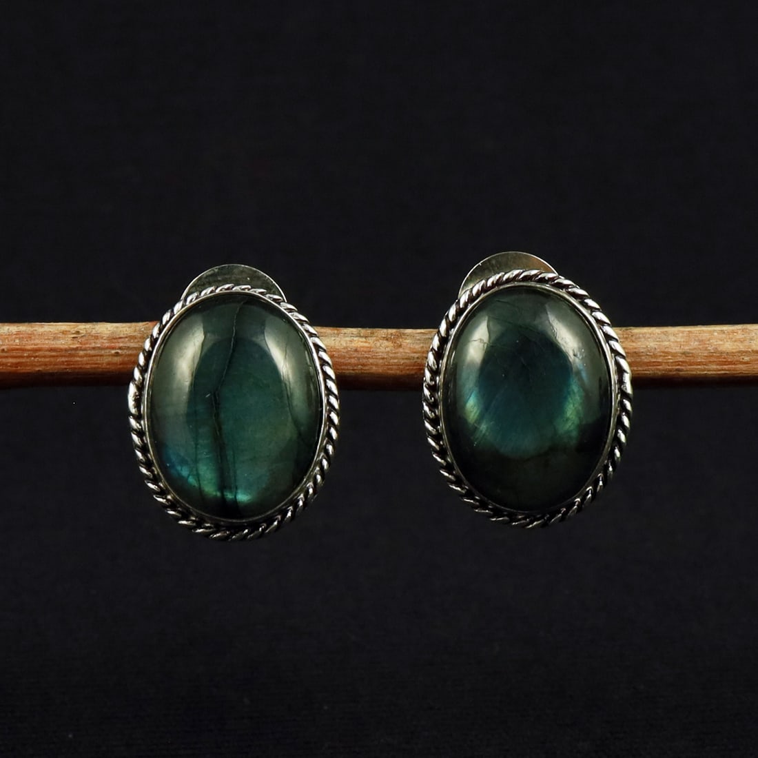 Natural Labradorite Sterling Silver Plated Handmade Stud Earring: Product ID: 260711131214 Product - Handmade Silver Plated Stud Earring Metal - 92.5 Sterling Silver Plated Earring Type - Stud Gemstone - Labradorite Gemstone Origin - Canada Gemstone Size - 12X16 MM 
