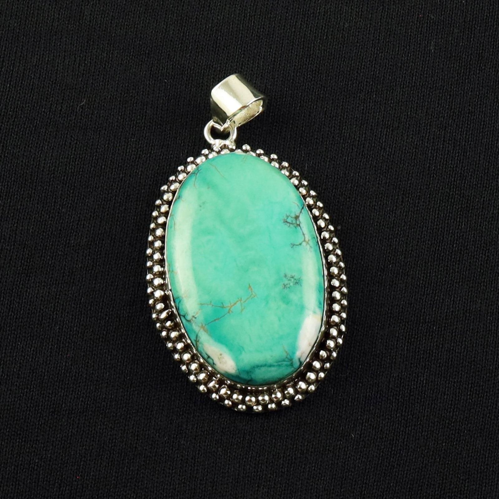 Natural Turquoise Sterling Silver Plated Handmade Pendant: Product ID: 260701140708 Product - Handmade Silver Plated Pendant Metal - 92.5 Sterling Silver Plated Pendant Size - 4x2.5 CM Gemstone - Turquoise Gemstone Origin - Tibet Gemstone Shape - Oval Pendant