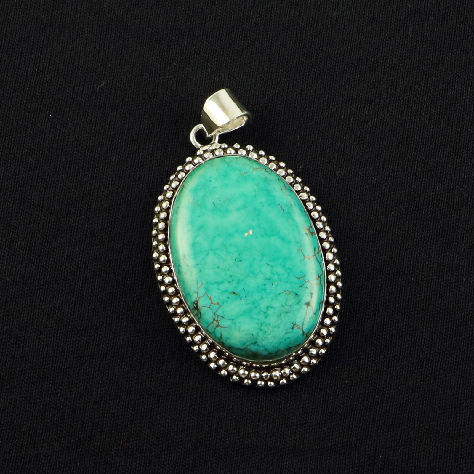 Natural Turquoise Sterling Silver Plated Handmade Pendant: Product ID: 260701140514 Product - Handmade Silver Plated Pendant Metal - 92.5 Sterling Silver Plated Pendant Size - 4x2.5 CM Gemstone - Turquoise Gemstone Origin - Tibet Gemstone Shape - Oval Pendant