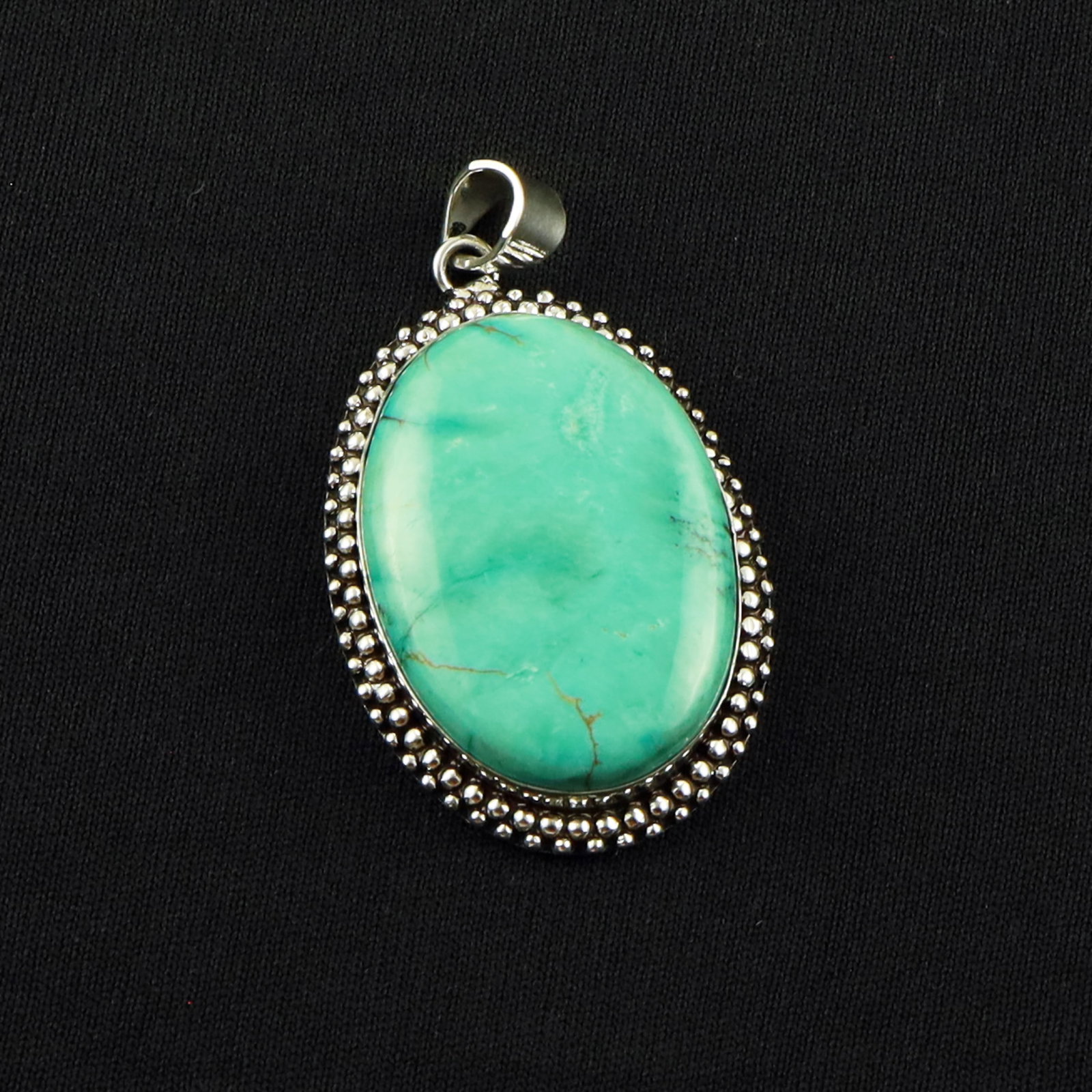Natural Turquoise Sterling Silver Plated Handmade Pendant: Product ID: 260701140329 Product - Handmade Silver Plated Pendant Metal - 92.5 Sterling Silver Plated Pendant Size - 4x3 CM Gemstone - Turquoise Gemstone Origin - Tibet Gemstone Shape - Oval Pendant W